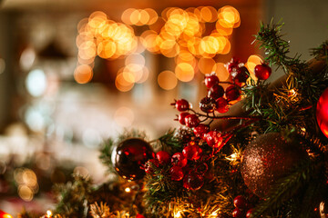 Christmas and New Year background of bokeh and fir branches