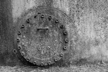 Old dirty fuel hatch for cleaning from liquid chemical waste and oil of an abandoned tank industrial plant