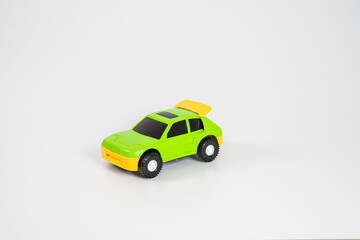 Toy plastic car isolated on white background.