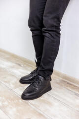 Men's black winter boots with genuine leather. Stylish men's shoes