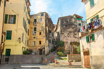 Fototapeta na wymiar View of local architecture in the medieval old town of Ventimiglia Alta in Italy, Liguria in the province of Imperia.