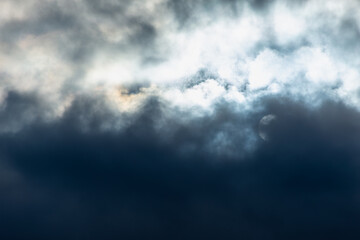 Snowy, thunderclouds in the sky.