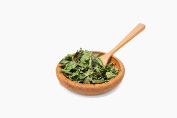 Mint for tea in a wooden bowl.