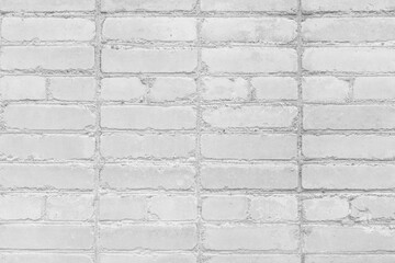 Obraz premium Non-standard irregular amateur brickwork blocks white stone wall texture background
