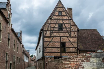 Deurstickers View of streets and houses of The Groot Begijnhof (Great Beguinage),  a completely restored historical quarter in the south of downtown Leuven, Belgium, listed as UNESCO world heritage in 1998 (1 (5) © Mltz
