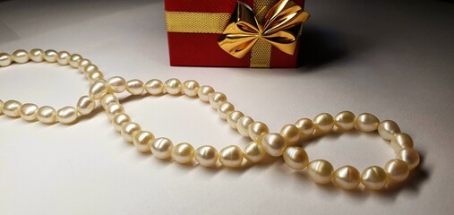 A beautiful necklace made of natural pearls. Pearl jewelry for women. Precious stones.