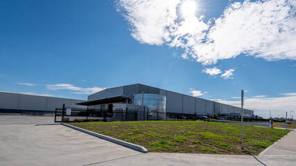 Fototapeta na wymiar Facade of the logistics warehouse at daytime