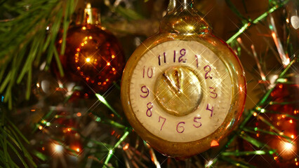 Christmas toy in the form of a clock on a festive tree