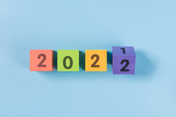 happy new year 2022 colorful cube on blue background