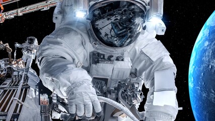 Astronaut spaceman do spacewalk while working for spaceflight mission at space station . Astronaut wear full spacesuit for operation . Elements of this image furnished by NASA space astronaut photos . © InfiniteFlow