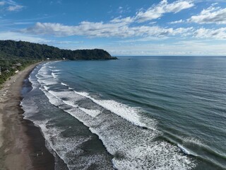 Aerial view of Jaco Beach in Costa Rica, surfing beach and paradise