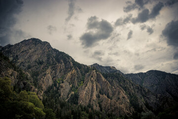 Scenic view of mountain scenery in a cloudy sky in Big Cottonwood Canyon, Salt Lake City, Utah, USA
