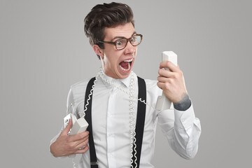 Angry employer screaming at phone