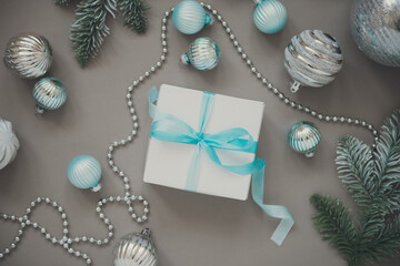 New year and Christmas tree decorations on grey background
