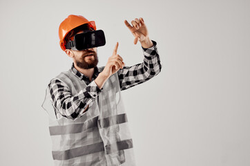 male worker in an orange helmet technology Professional isolated background
