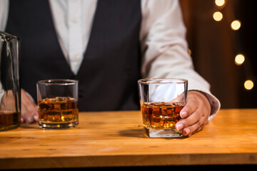 Bartender Serve Whiskey, on wood bar, 
