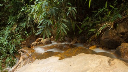 Mountain stream in the forest, long exposure picture