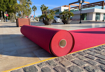 rolling red carpet in city