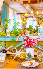 Christmas table. Festive table setting for New Year's dinner. Beautiful decoration in the restaurant awaiting guests.