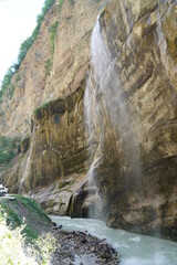 Fototapeta na wymiar Beautiful waterfall in the mountains