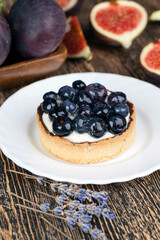 tartlet with cream and blueberries
