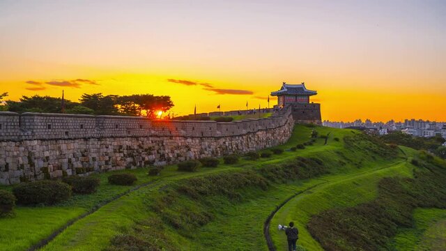 Time lapse Hwaseong Fortress in Sunset, Traditional Architecture at Suwon, South Korea.