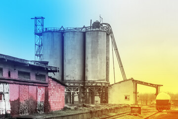 Fototapeta na wymiar Fuel old chemical tank fertilizer barrel oil in an industrial abandoned plant
