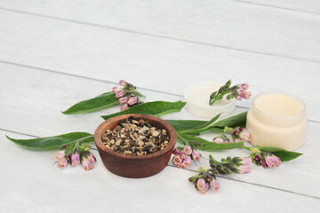 Comfrey healing herb ointment used in herbal medicine. Treats skin problems, burns, sprains and...