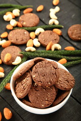 Bowl of fresh baked dry fruits, cashew nuts, almonds cookies.