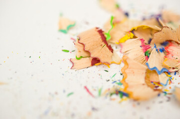 abstract colorful background of pencil shavings and graphite powder