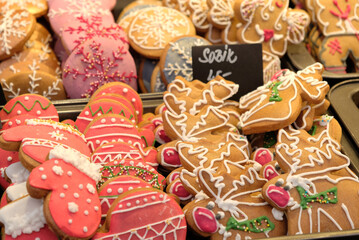 Close-up Traditional sweets and Gingerbread cookies on the Christmas Market in Prague - November, 2021. Gingerbread cookies in the different shape. Selective focus