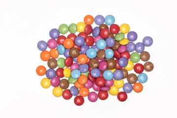 pile colorful round sweets white background