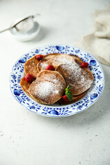 Traditional homemade pancakes with raspberry
