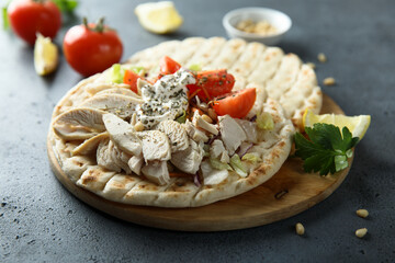 Homemade pita bread with chicken and vegetables