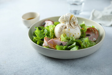Green salad with mortadella and burrata cheese