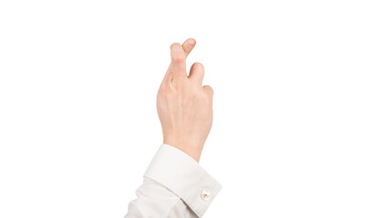 Naklejka premium crossed fingers gesture of make a wish with male hand isolated on white, false promises