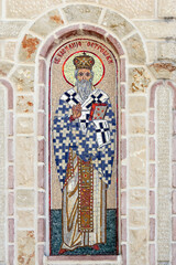 Outdoor mosaic facade decoration depicting Basil of Ostrog. The text in English means Basil of Ostrog