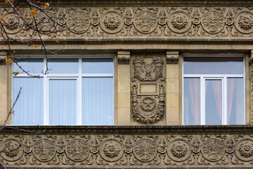 Obraz premium Relief pattern decoration on old building facade in Kyiv Ukraine