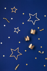 Three gold crowns for Traditional Three King's Day of January 6, blue background.