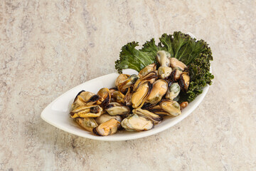 Tasty marinated mussels in the bowl
