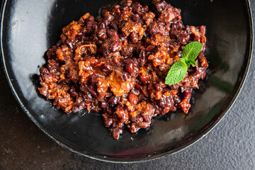 red beans with meat and vegetables georgian cuisine lobio meal snack on the table copy space food background rustic. top view