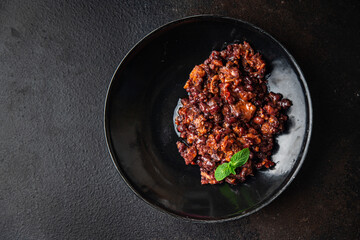red beans with meat and vegetables georgian cuisine lobio meal snack on the table copy space food background rustic. top view