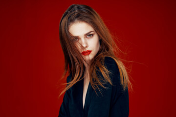 red-haired woman with red lips posing hairstyle glamor