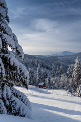Fototapeta na wymiar Winter landscape with Snezka hill, Giant Mountains (Krkonose), Eastern Bohemia, Czech Republic