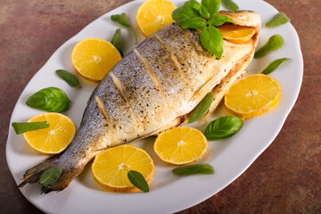 Baked gilt-head bream fish