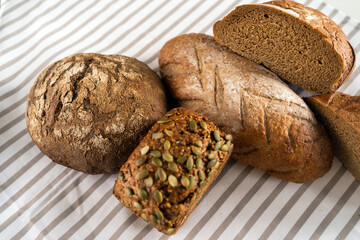 Baked goods to order at the bakery. Fresh hot delicious bread is on the table.