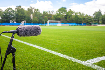 directional microphone on a football field to record sound when broadcasting for TV