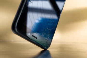 crashed smartphone or phone with broken AMOLED glass display