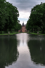 Fototapeta na wymiar Castel estate with greenery, sky and open spaces in The Netherlands, Kastel De Haar
