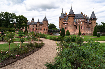 Fototapeta na wymiar Castel estate with greenery, sky and open spaces in The Netherlands, Kastel De Haar